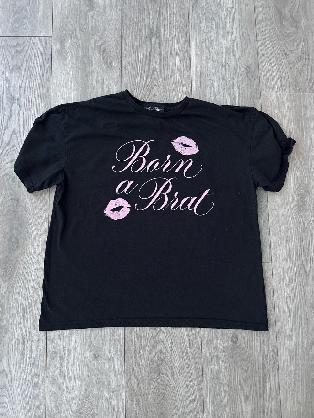 born a brat graphic tee